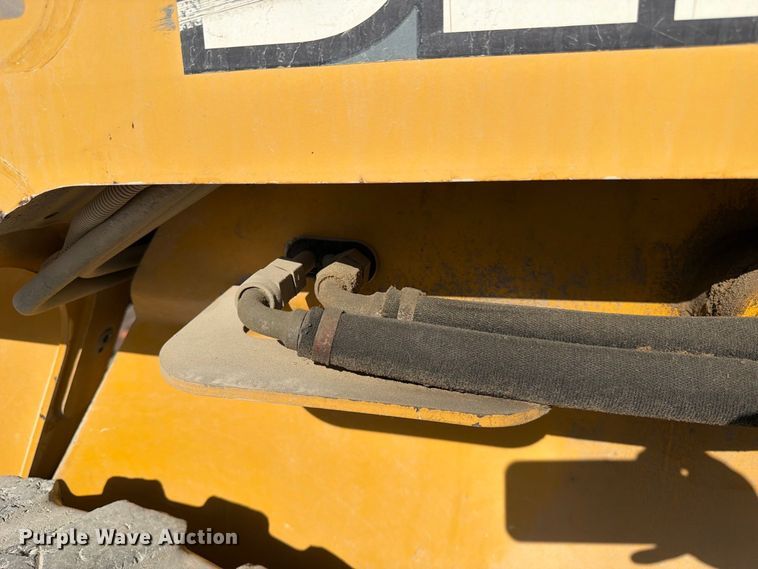 image for item FK3858 2009 John Deere 325 skid steer loader