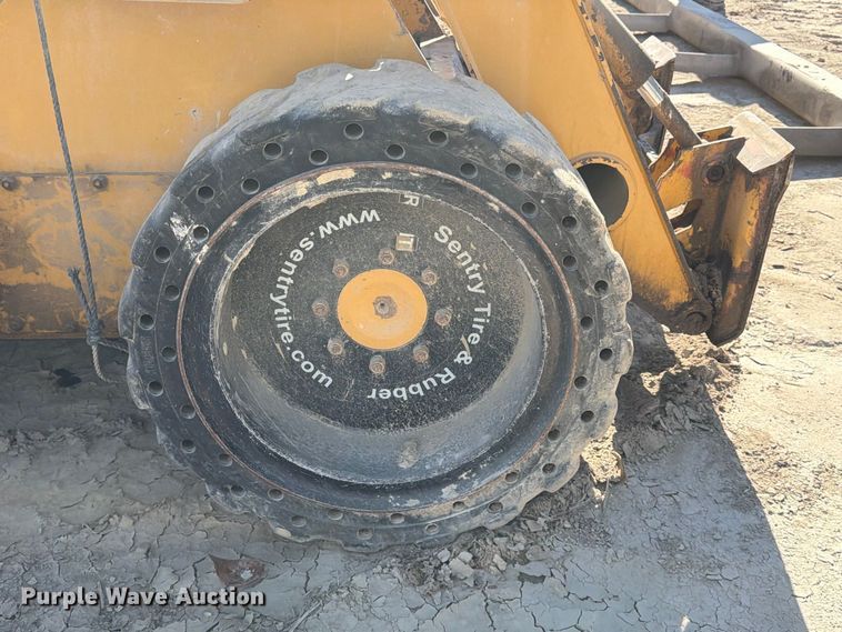 image for item FK3858 2009 John Deere 325 skid steer loader