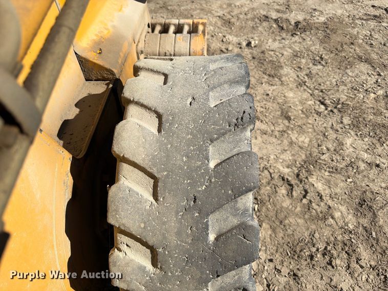 image for item FK3858 2009 John Deere 325 skid steer loader
