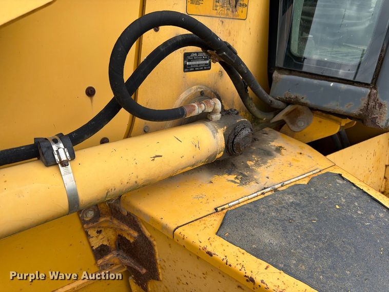 image for item FK3860 2004 John Deere 310SG backhoe