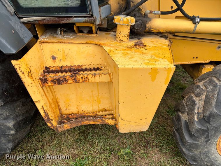 image for item FK3860 2004 John Deere 310SG backhoe