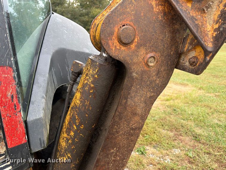 image for item FK3860 2004 John Deere 310SG backhoe