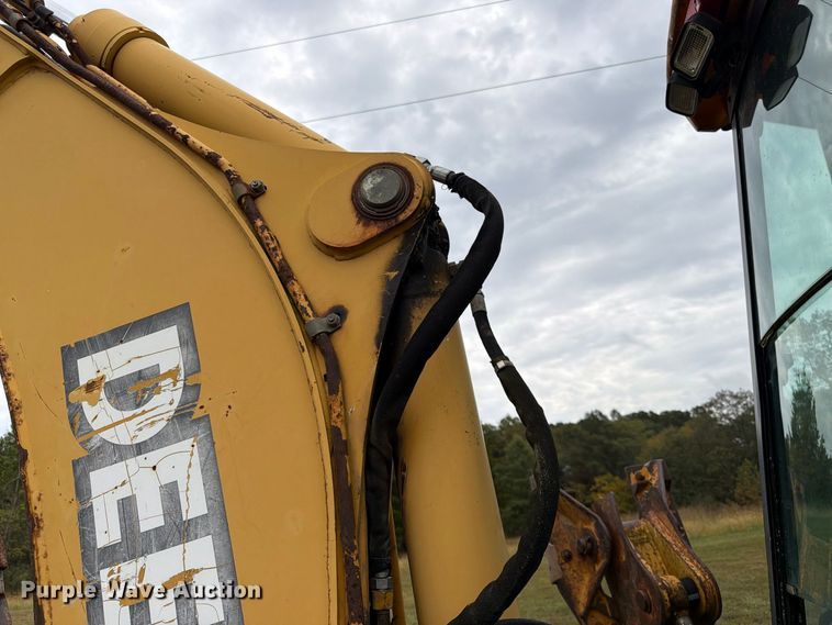 image for item FK3860 2004 John Deere 310SG backhoe
