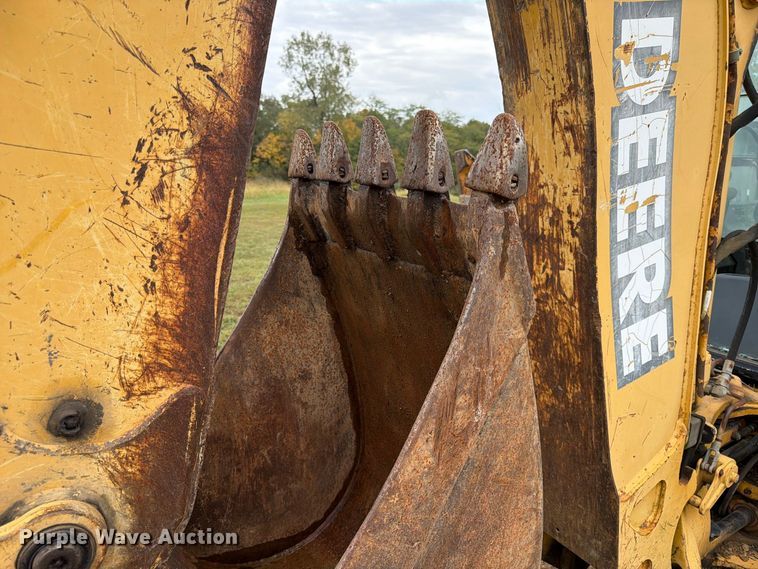 image for item FK3860 2004 John Deere 310SG backhoe