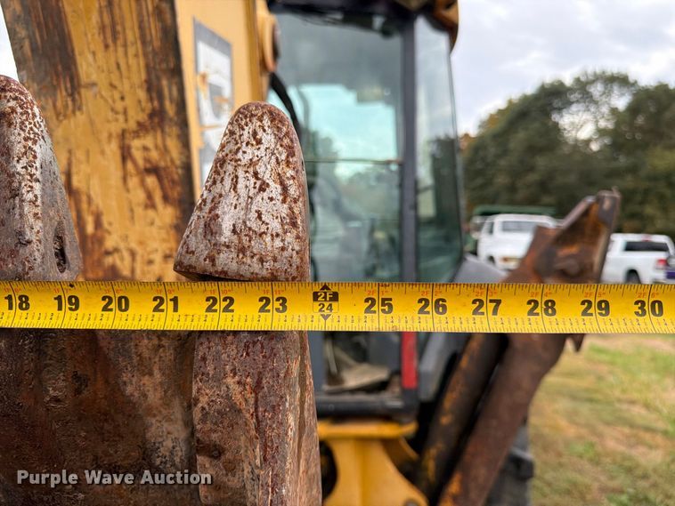 image for item FK3860 2004 John Deere 310SG backhoe