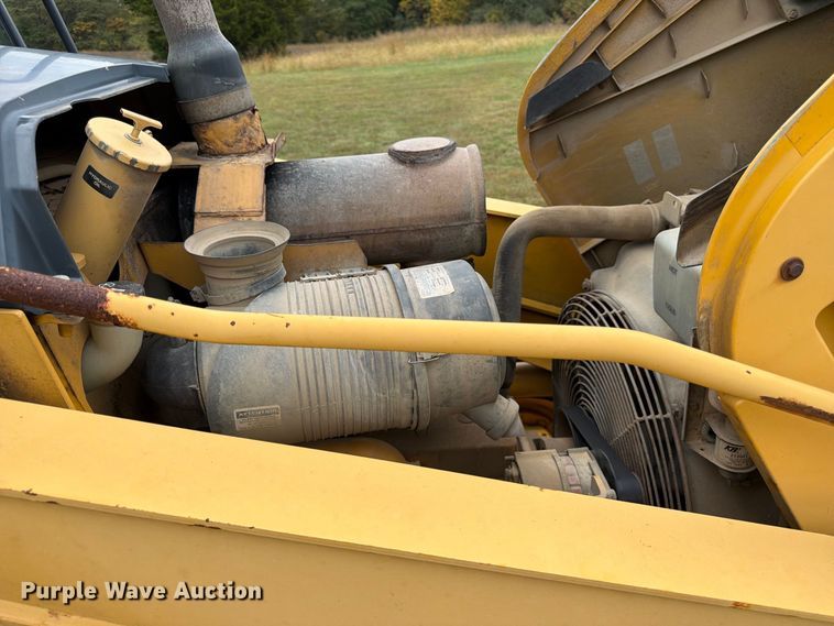 image for item FK3860 2004 John Deere 310SG backhoe