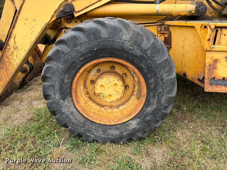 image for item FK3860 2004 John Deere 310SG backhoe