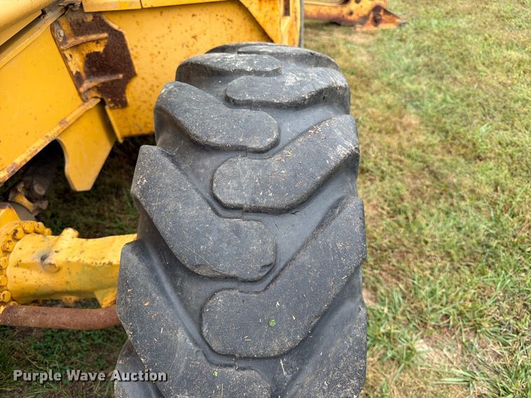 image for item FK3860 2004 John Deere 310SG backhoe