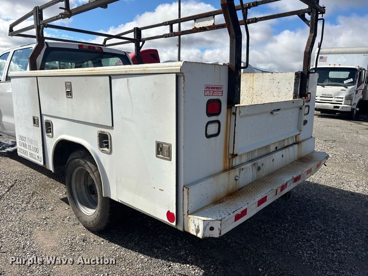 image for item YA5140 2016 GMC Sierra 3500HD Crew Cab utility bed pickup truck