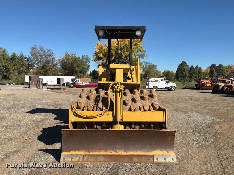 image for item ED0224 1996 Caterpillar CP-433C single drum vibratory padfoot roller