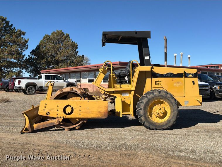 image for item ED0224 1996 Caterpillar CP-433C single drum vibratory padfoot roller