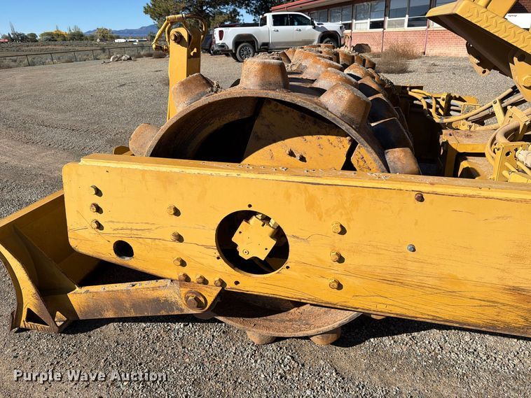 image for item ED0224 1996 Caterpillar CP-433C single drum vibratory padfoot roller