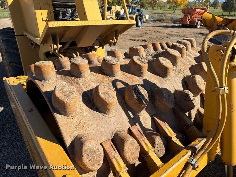 image for item ED0224 1996 Caterpillar CP-433C single drum vibratory padfoot roller