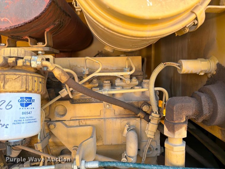 image for item ED0224 1996 Caterpillar CP-433C single drum vibratory padfoot roller