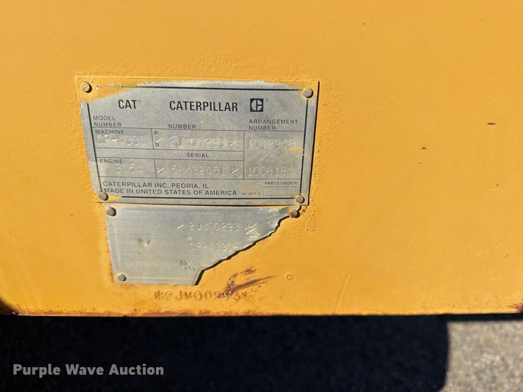 image for item ED0224 1996 Caterpillar CP-433C single drum vibratory padfoot roller