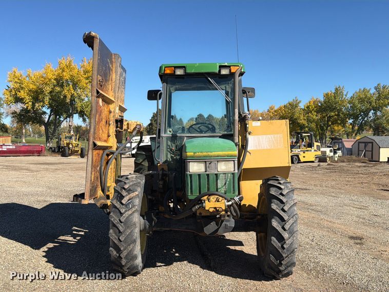 image for item ED0227 1997 John Deere 5500 MFWD tractor