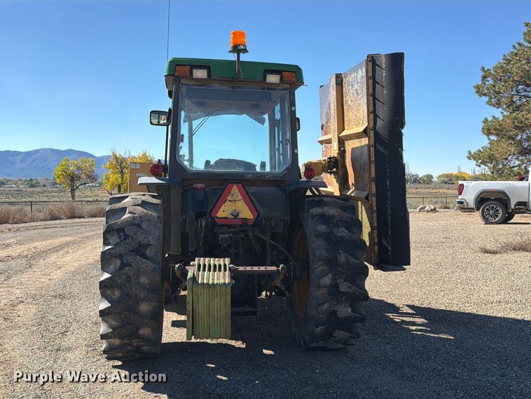 image for item ED0227 1997 John Deere 5500 MFWD tractor