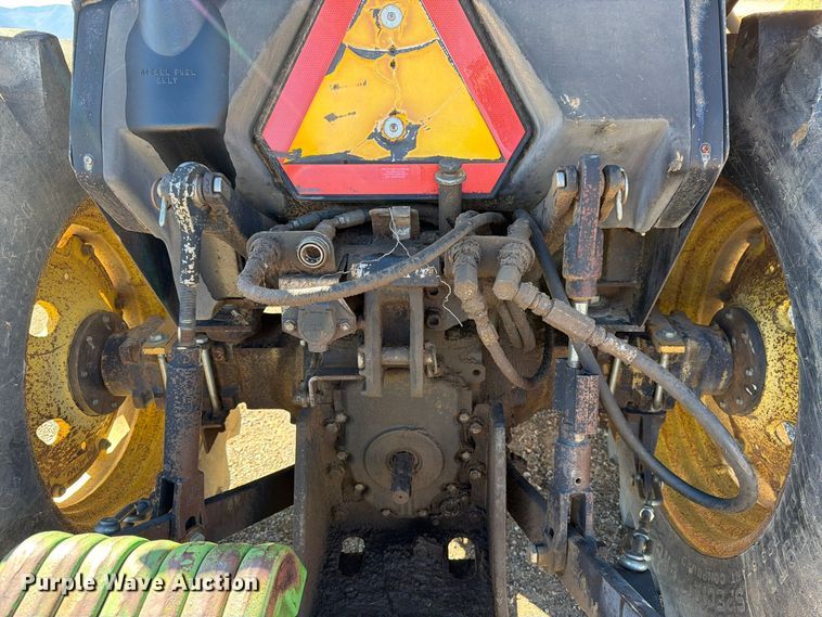 image for item ED0227 1997 John Deere 5500 MFWD tractor