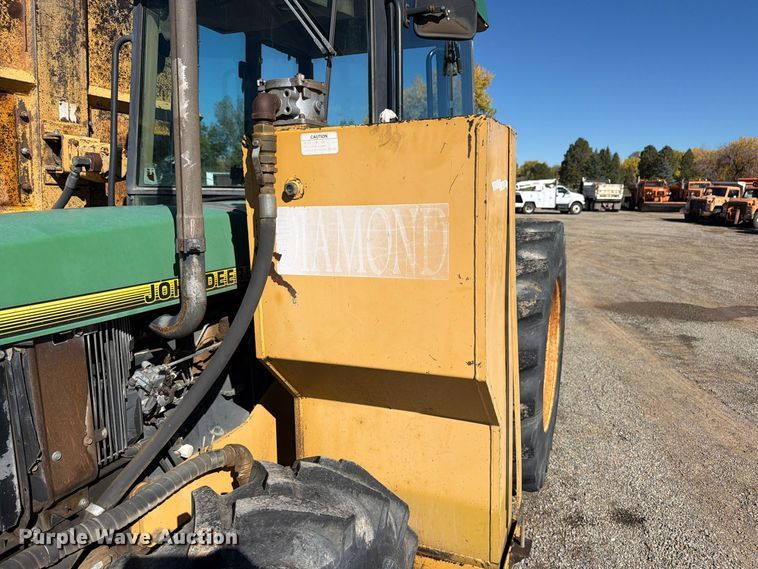 image for item ED0227 1997 John Deere 5500 MFWD tractor