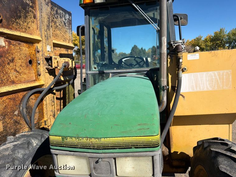 image for item ED0227 1997 John Deere 5500 MFWD tractor