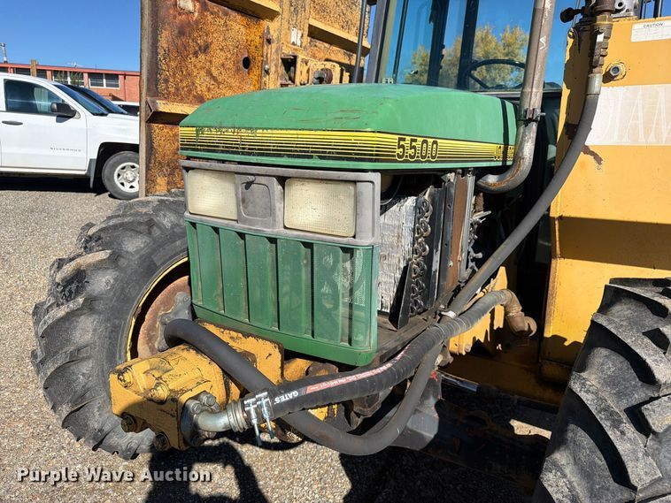 image for item ED0227 1997 John Deere 5500 MFWD tractor