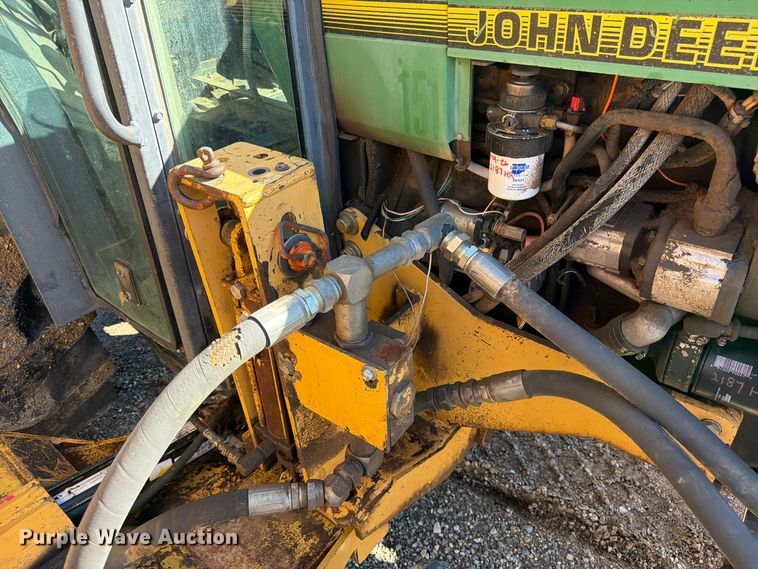 image for item ED0227 1997 John Deere 5500 MFWD tractor