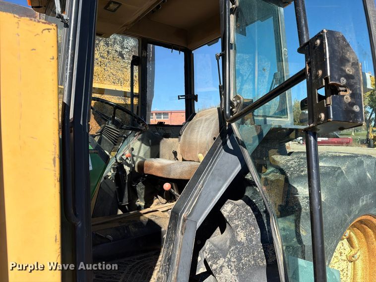 image for item ED0227 1997 John Deere 5500 MFWD tractor