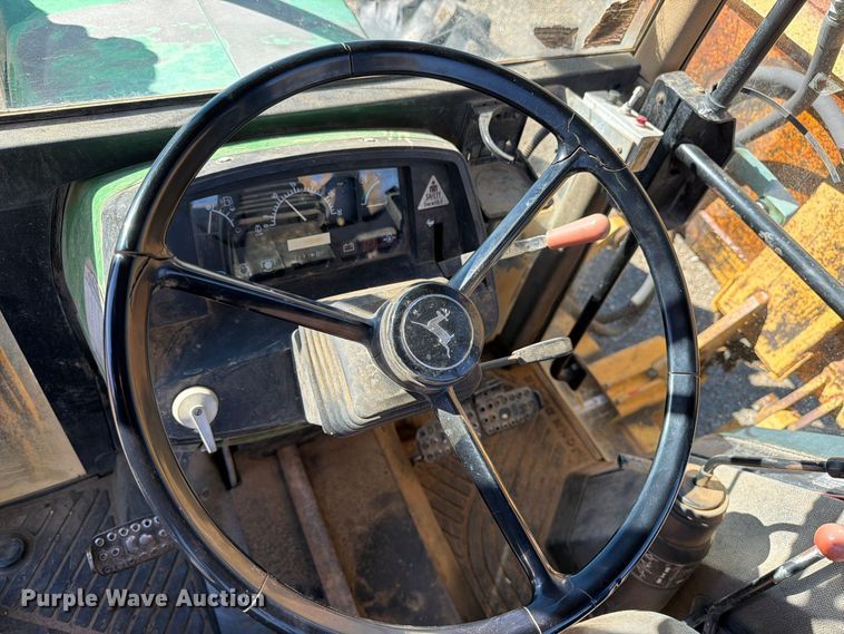 image for item ED0227 1997 John Deere 5500 MFWD tractor