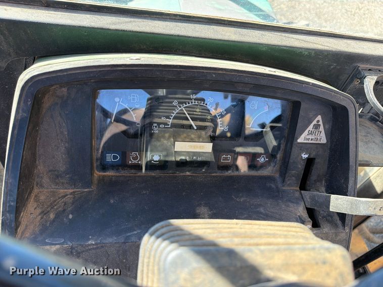 image for item ED0227 1997 John Deere 5500 MFWD tractor
