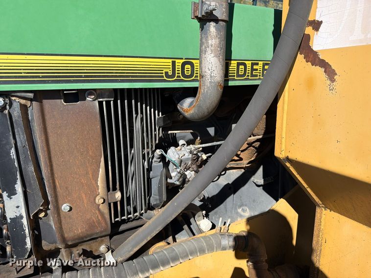 image for item ED0227 1997 John Deere 5500 MFWD tractor