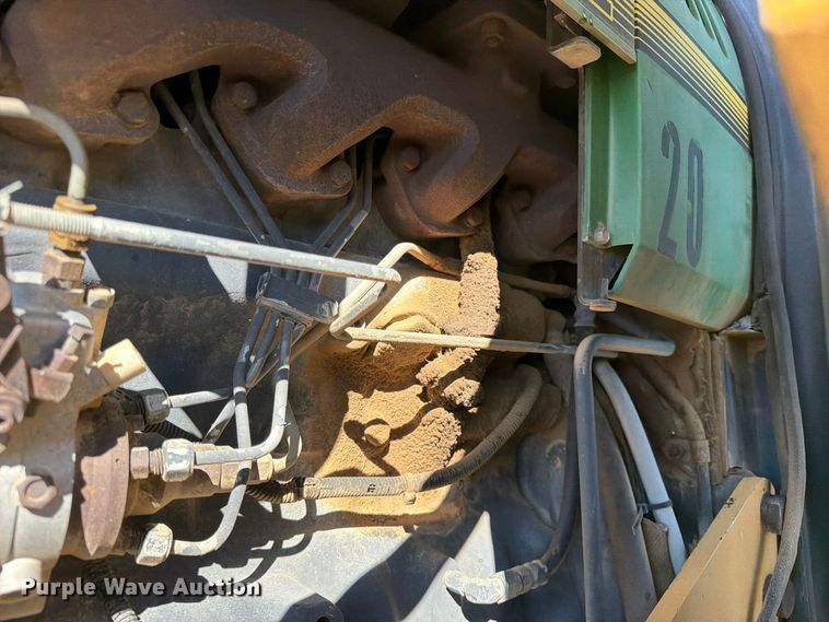 image for item ED0227 1997 John Deere 5500 MFWD tractor