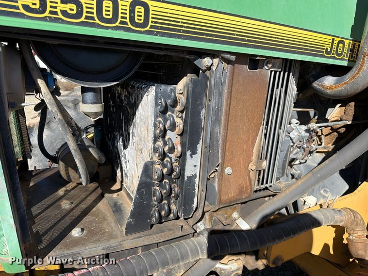 image for item ED0227 1997 John Deere 5500 MFWD tractor