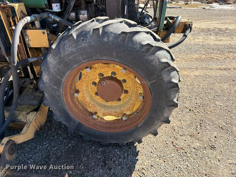 image for item ED0227 1997 John Deere 5500 MFWD tractor