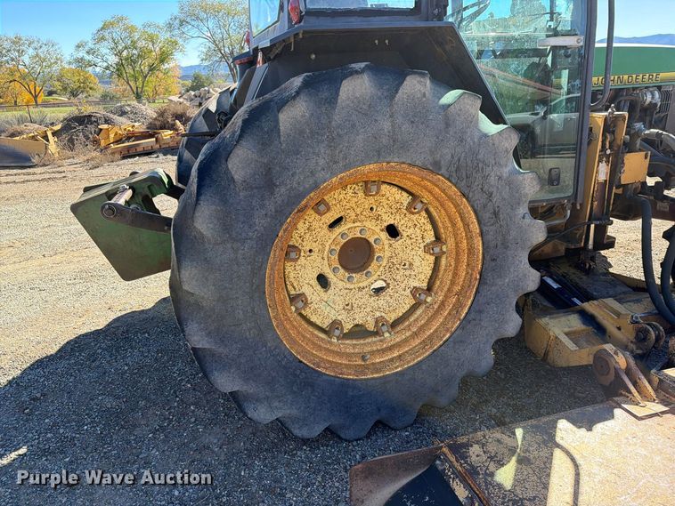 image for item ED0227 1997 John Deere 5500 MFWD tractor