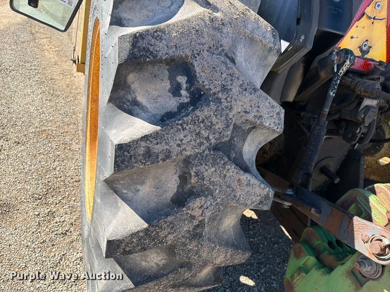 image for item ED0227 1997 John Deere 5500 MFWD tractor