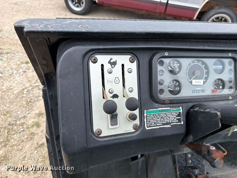 image for item EW5191 1999 Cushman 4W 31 HP Turf utility vehicle