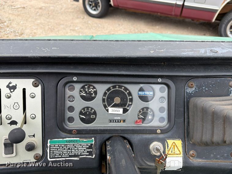 image for item EW5191 1999 Cushman 4W 31 HP Turf utility vehicle