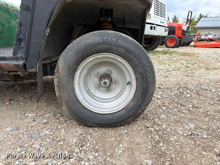 image for item EW5191 1999 Cushman 4W 31 HP Turf utility vehicle