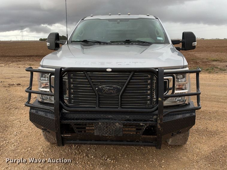 image for item FC0494 2022 Ford F350 Super Duty Crew Cab dump flatbed pickup truck