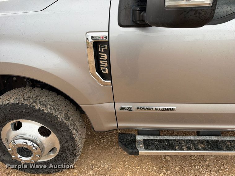 image for item FC0494 2022 Ford F350 Super Duty Crew Cab dump flatbed pickup truck