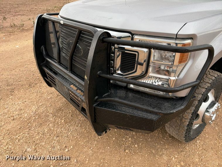 image for item FC0494 2022 Ford F350 Super Duty Crew Cab dump flatbed pickup truck