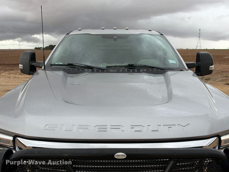 image for item FC0494 2022 Ford F350 Super Duty Crew Cab dump flatbed pickup truck