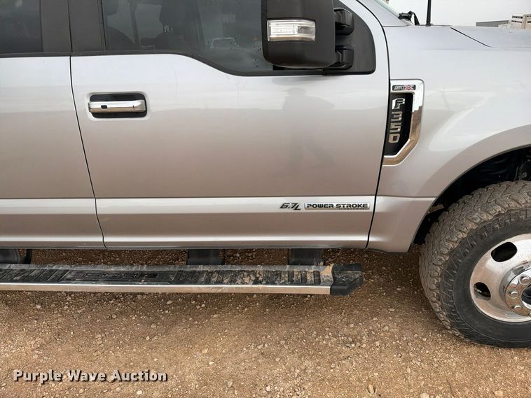image for item FC0494 2022 Ford F350 Super Duty Crew Cab dump flatbed pickup truck