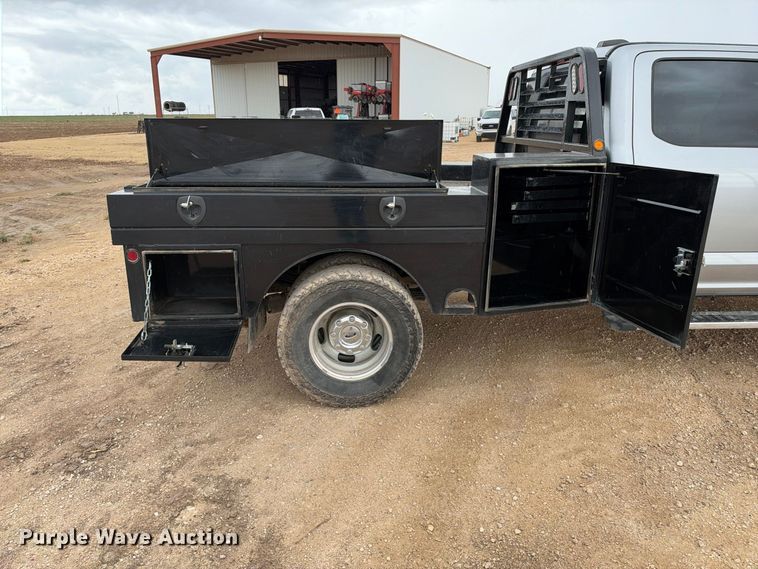 image for item FC0494 2022 Ford F350 Super Duty Crew Cab dump flatbed pickup truck