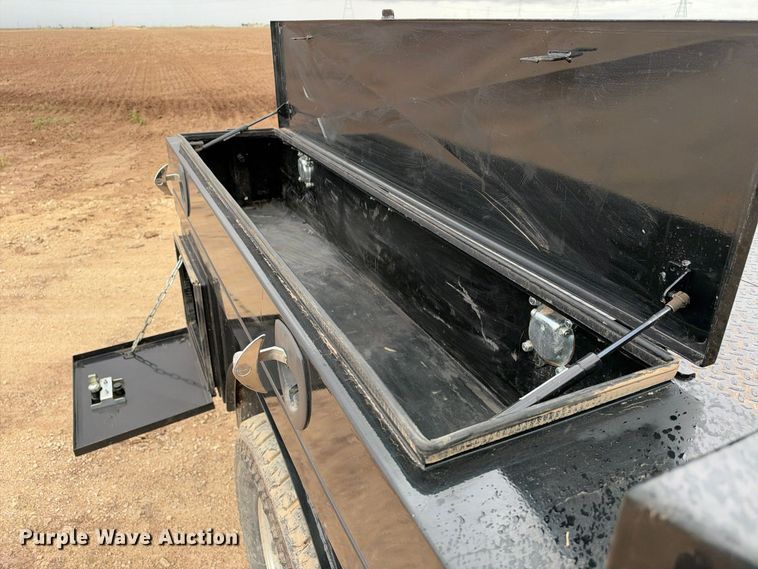 image for item FC0494 2022 Ford F350 Super Duty Crew Cab dump flatbed pickup truck