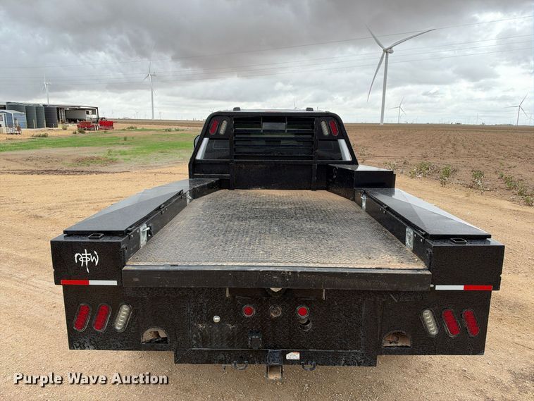 image for item FC0494 2022 Ford F350 Super Duty Crew Cab dump flatbed pickup truck