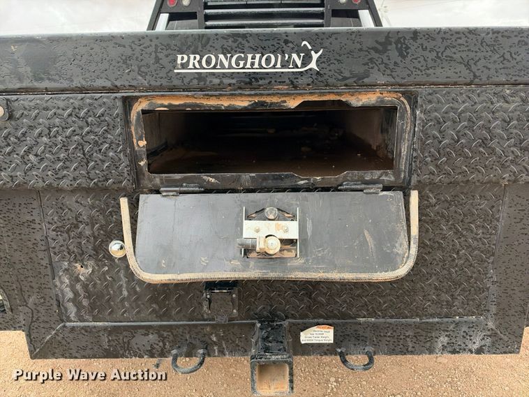 image for item FC0494 2022 Ford F350 Super Duty Crew Cab dump flatbed pickup truck