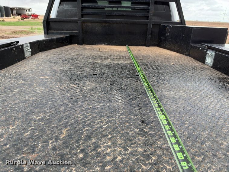 image for item FC0494 2022 Ford F350 Super Duty Crew Cab dump flatbed pickup truck