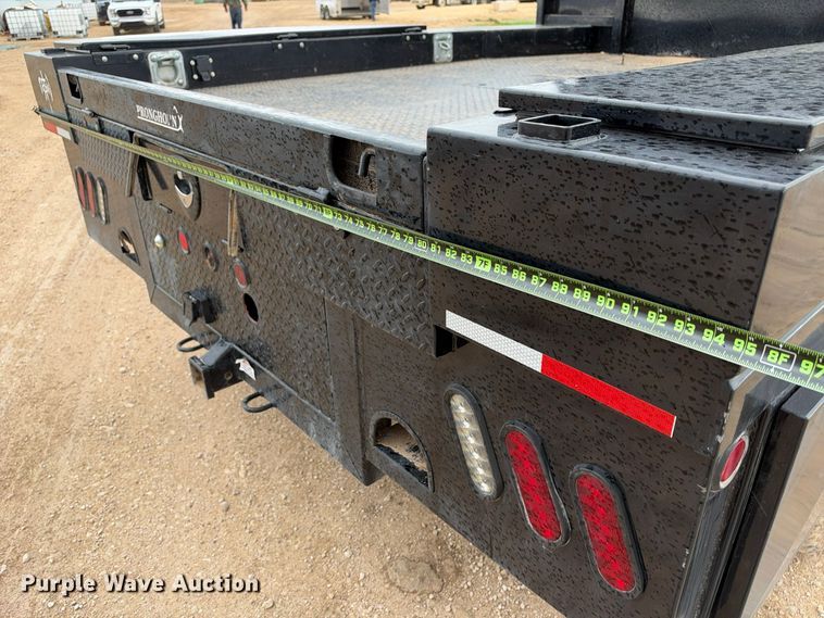 image for item FC0494 2022 Ford F350 Super Duty Crew Cab dump flatbed pickup truck