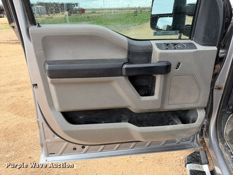 image for item FC0494 2022 Ford F350 Super Duty Crew Cab dump flatbed pickup truck